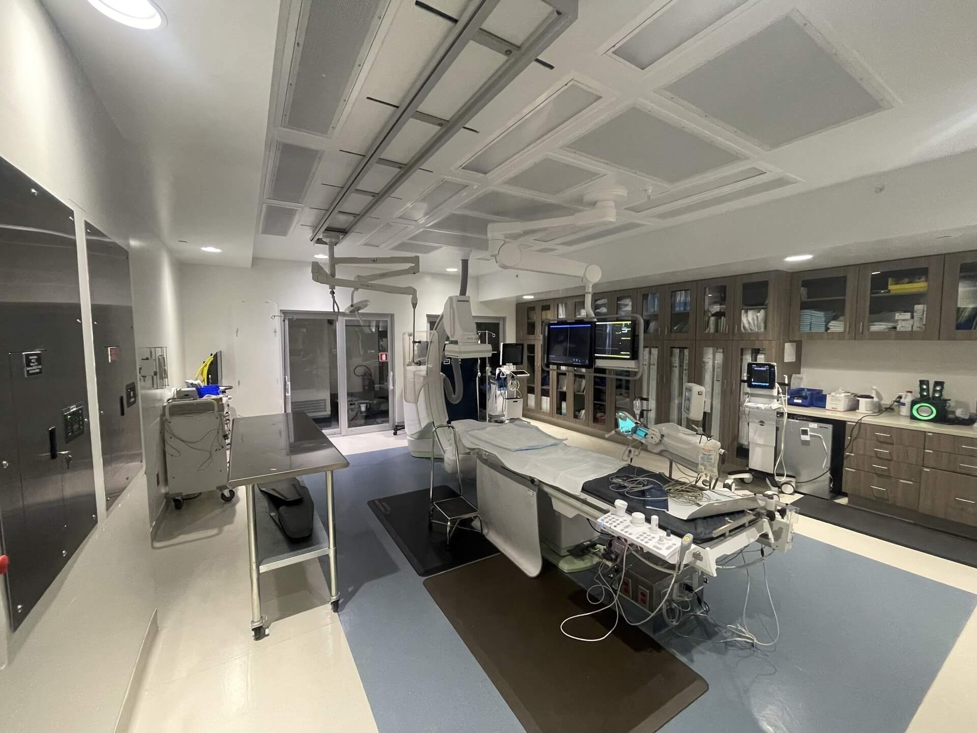 Empty hospital operating room with advanced medical equipment and monitors